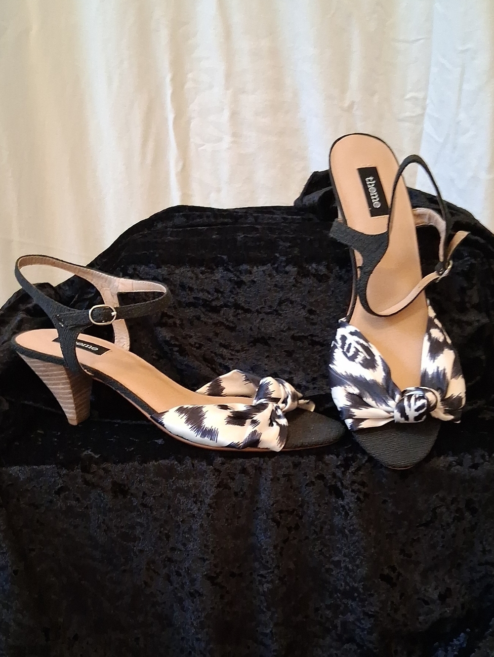 Theme Black Ankle Strap Heels with Black-and-White Knotted Satin Toe